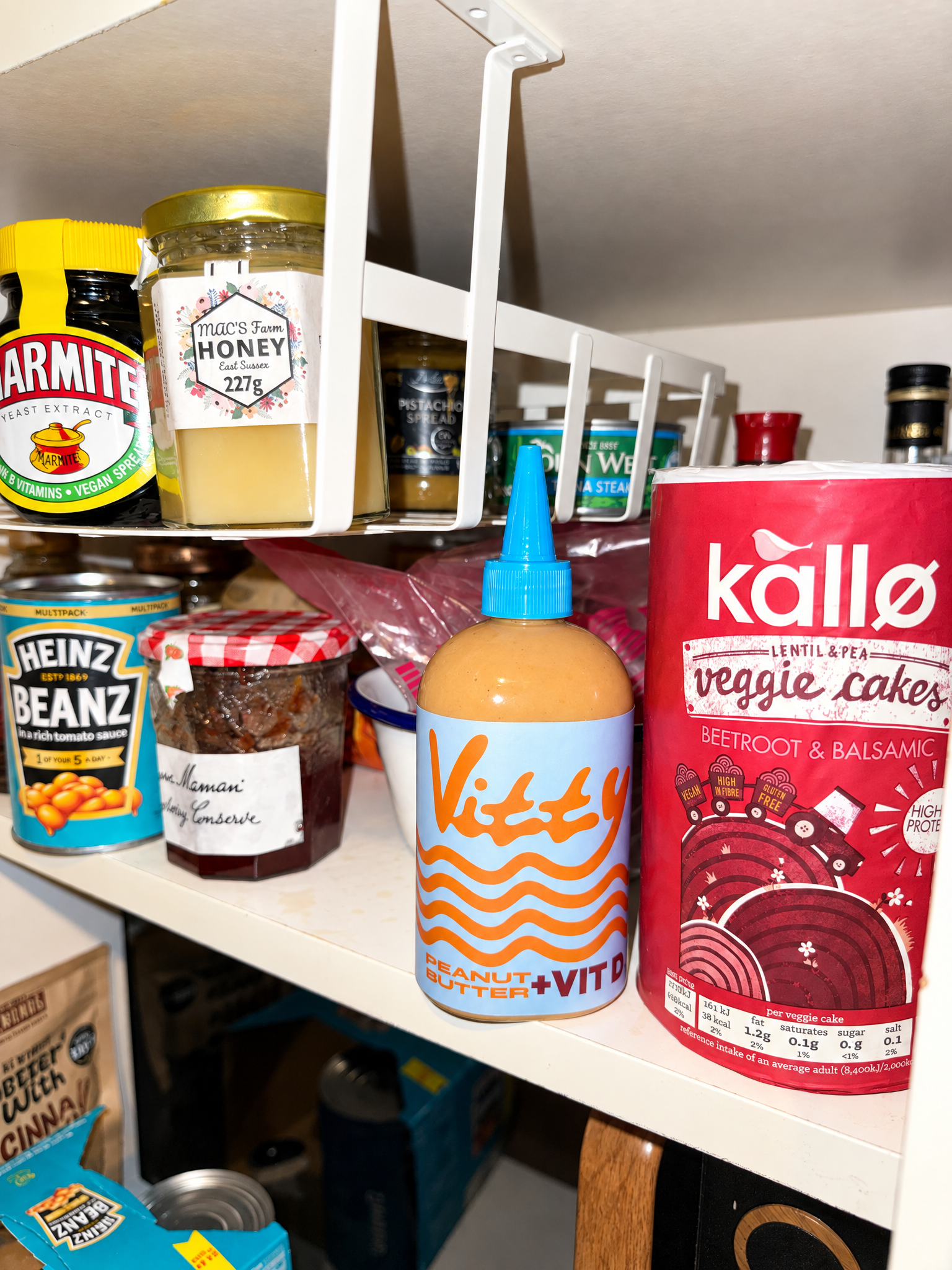 Vitty peanut butter bottle on a kitchen shelf